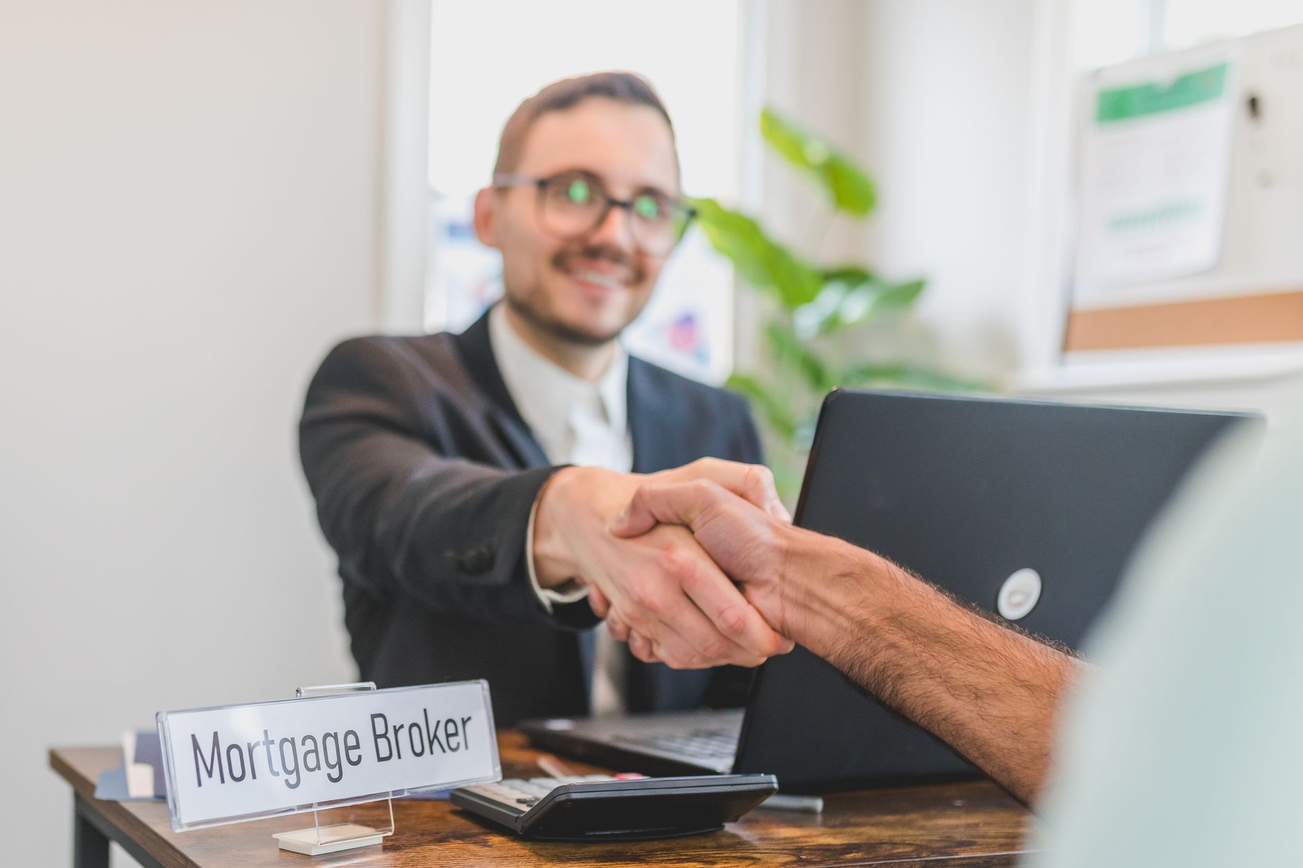 couple meeting mortgage broker