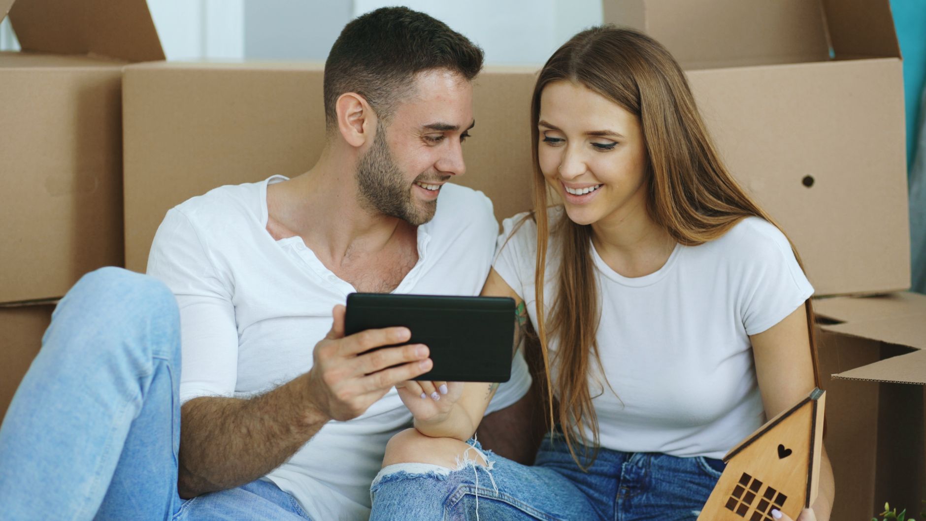 couple searching real estate online
