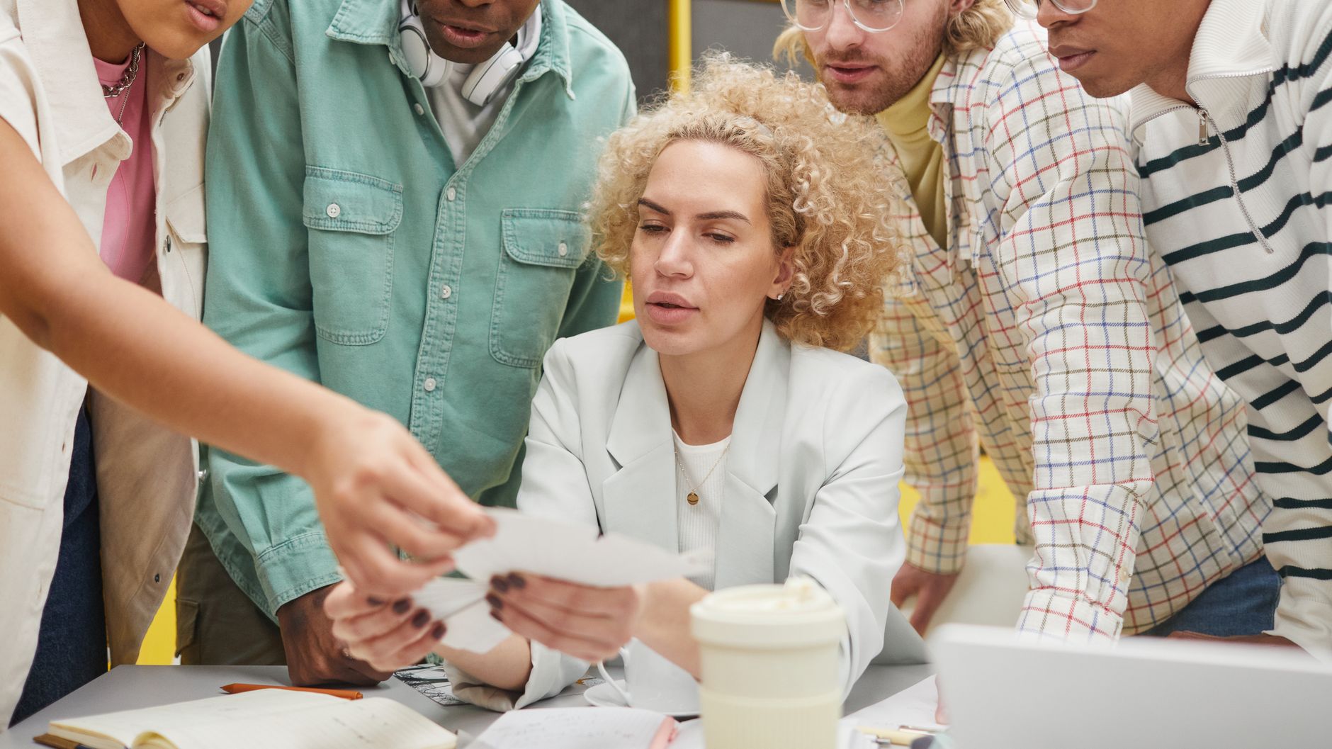 group of diverse professionals collaborating in a modern office