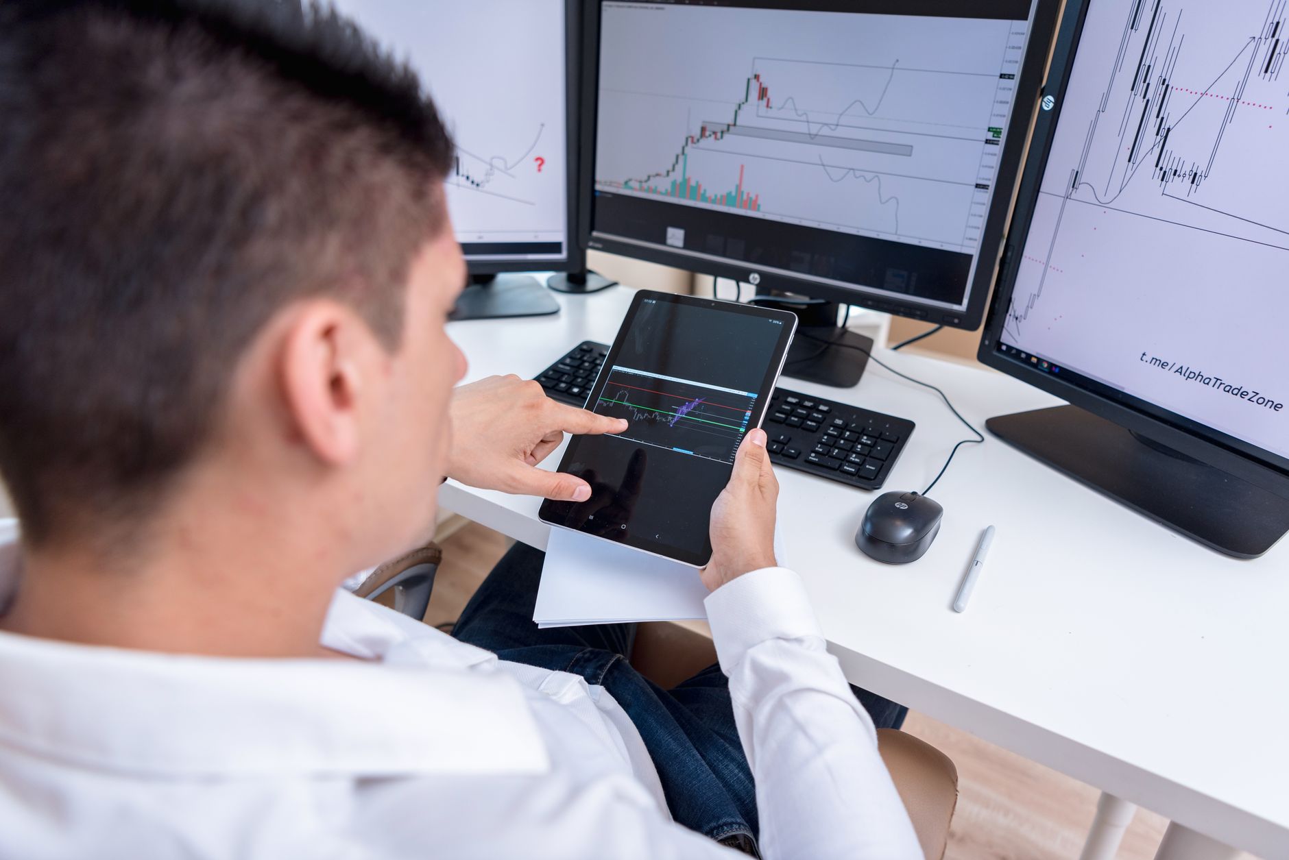 investor analyzing financial charts