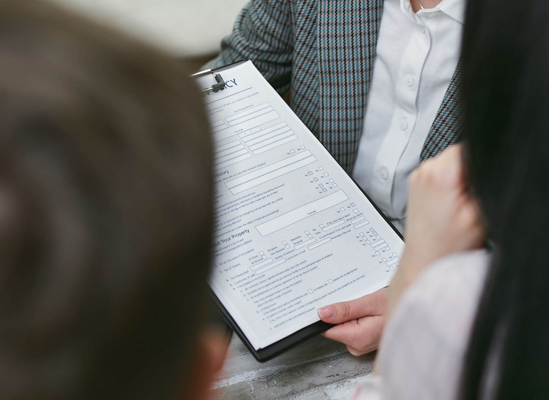 landlord explaining rental contract to tenant