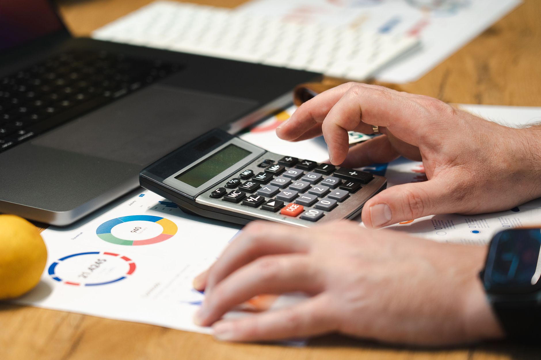 person using laptop to compare financial offers