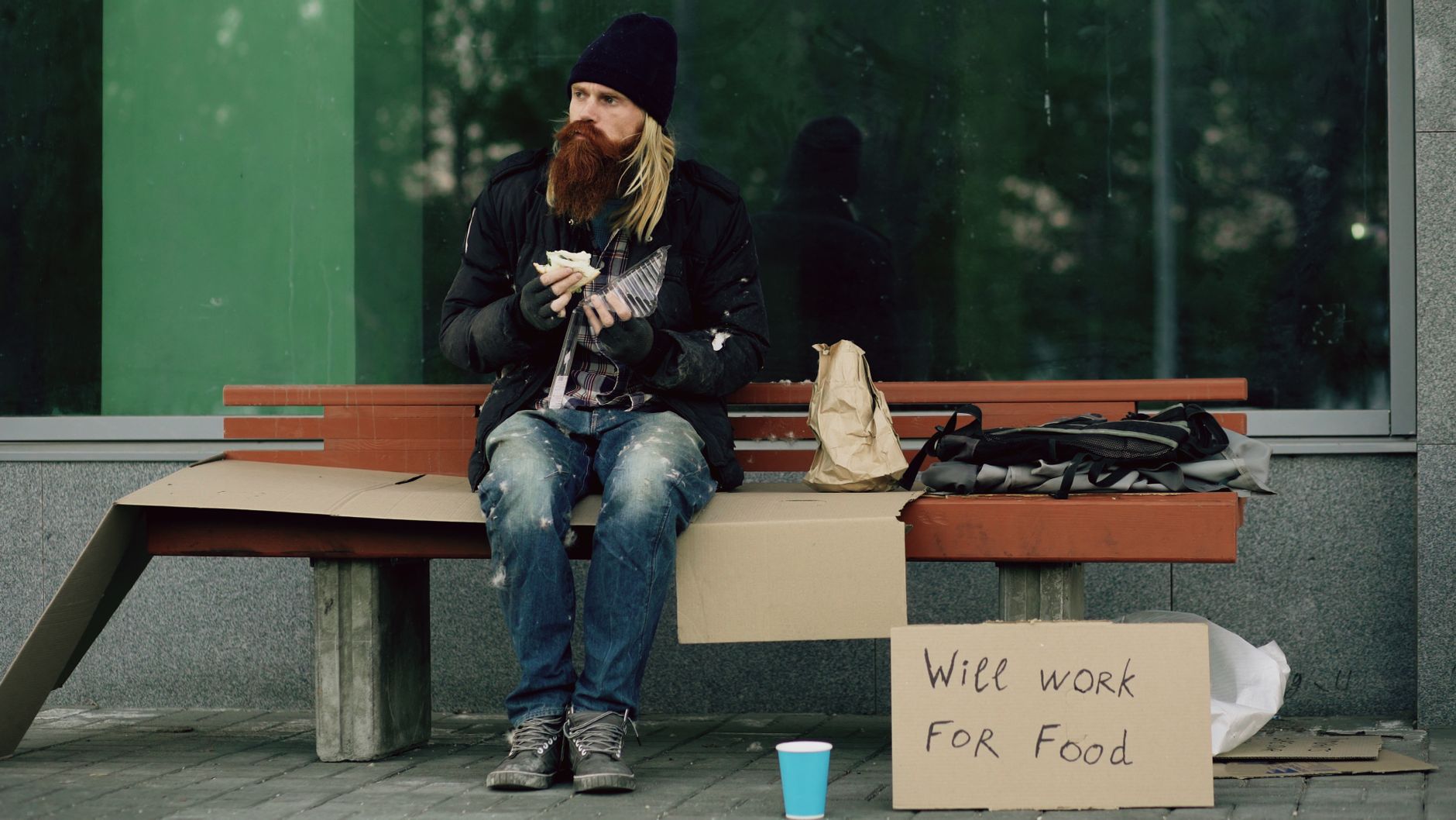 social worker helping homeless person