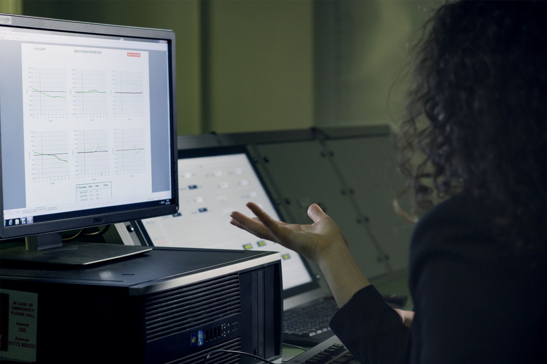 person analyzing data on computer