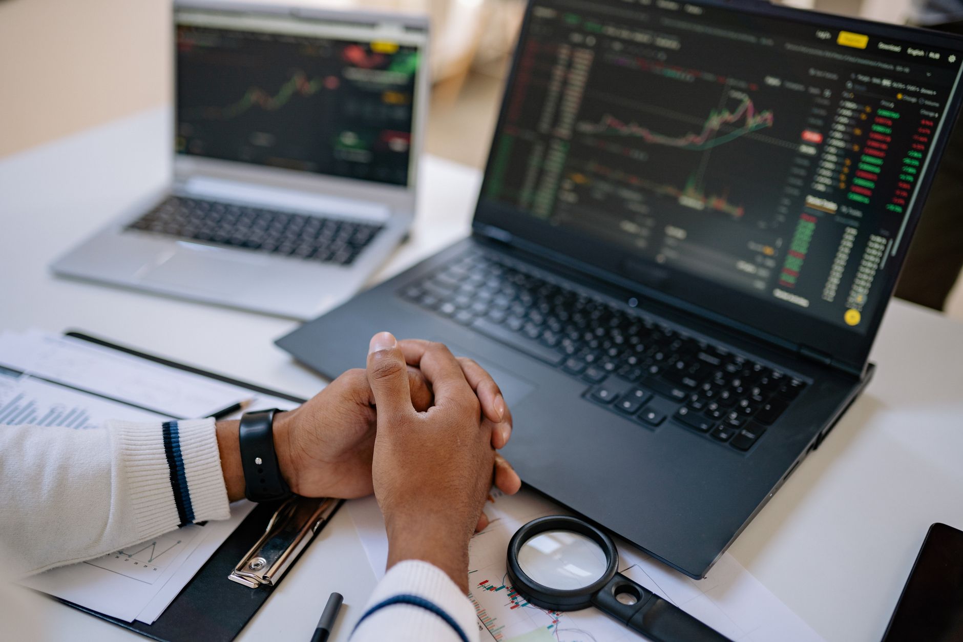 person doing financial analysis on computer