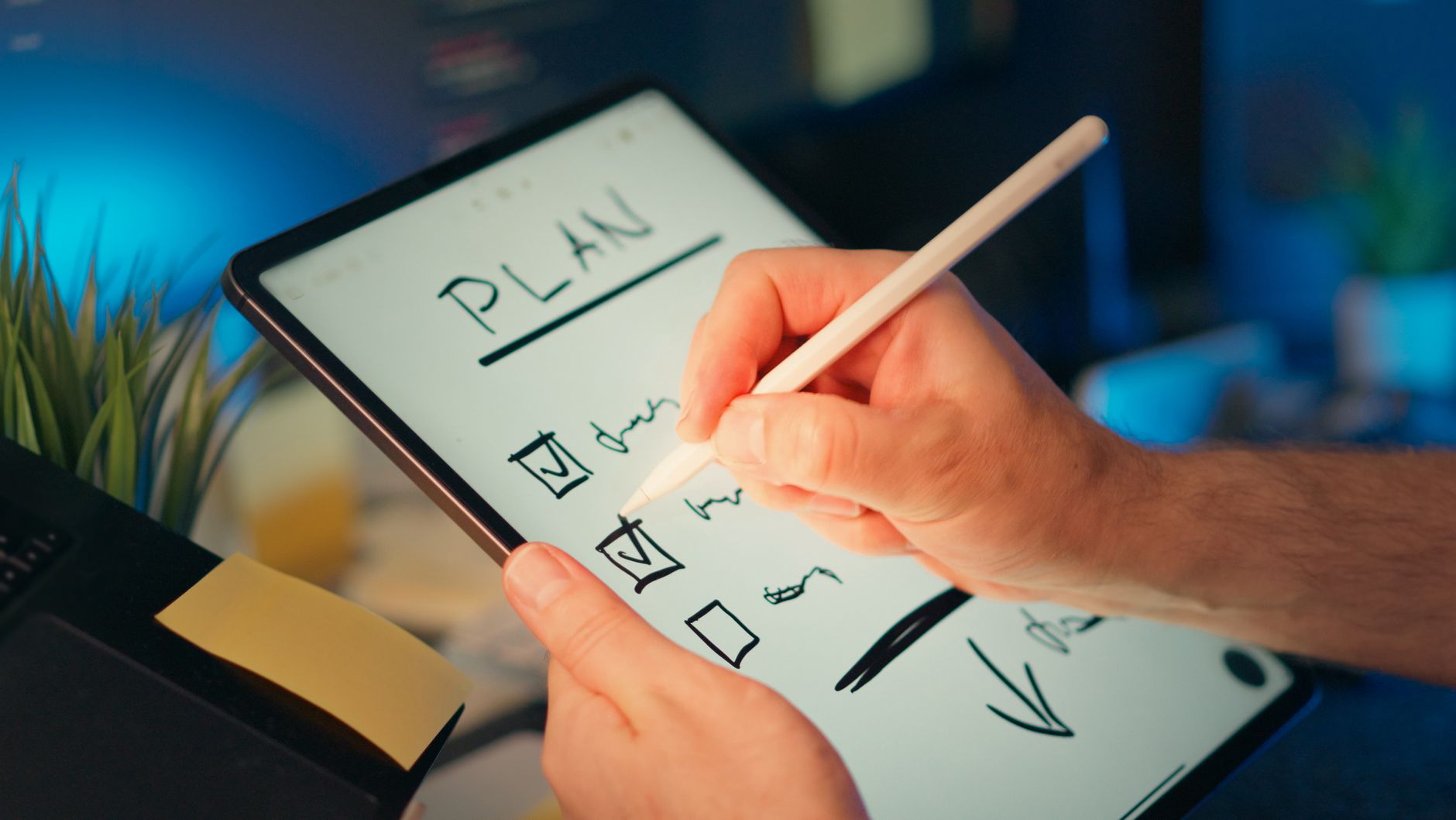 small business owner looking at tablet, managing schedule